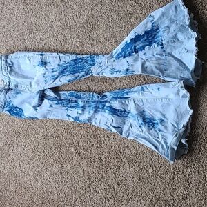 Acid wash bell bottom jeans